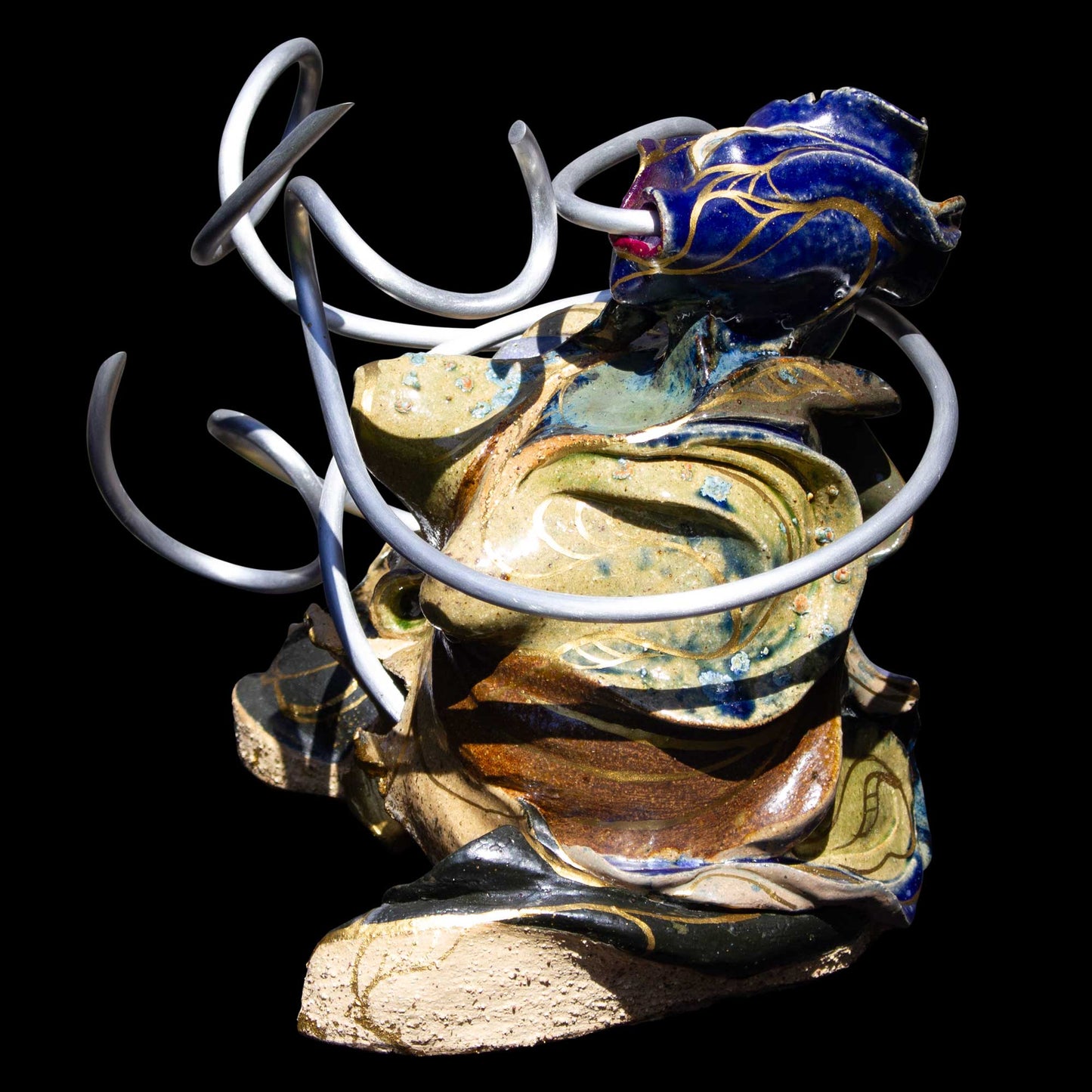 Ceramic sculpture about earth suffering