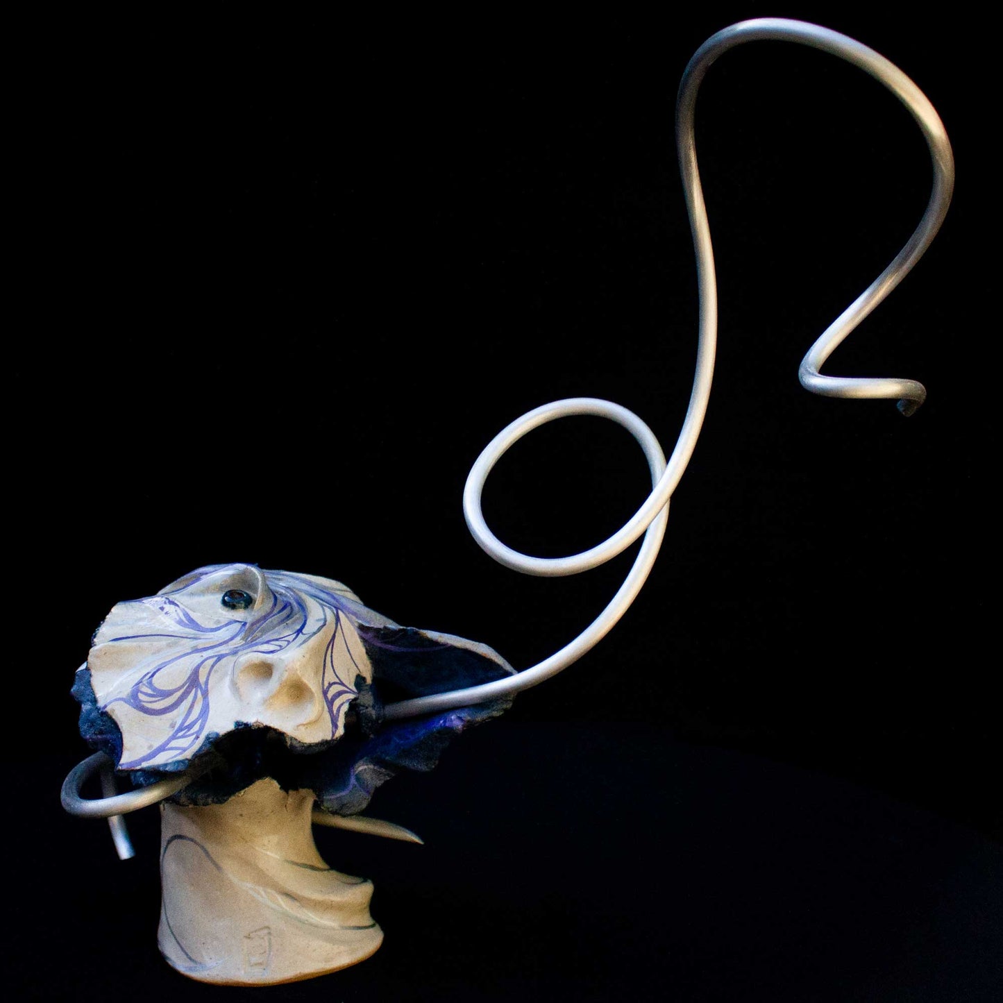 Twisted aluminium rod with ceramic head