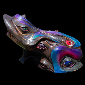 Amphibian sculpture with iridescent colours