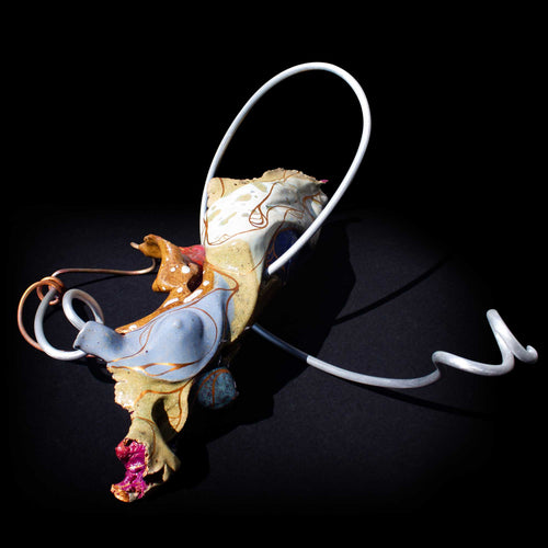 Ceramic nude suspended on coiled form