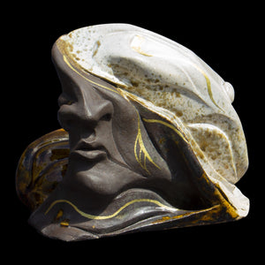 ceramic sculpture of heads