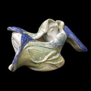 Dancing ceramic figurine