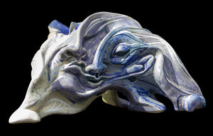 Blue ceramic face sculpture