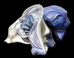 Blue multi faced ceramic figure
